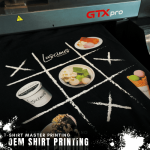 โรงงานผลิตเสื้อยืดพร้อมสกรีน DTG และ DFT ตามแบบ